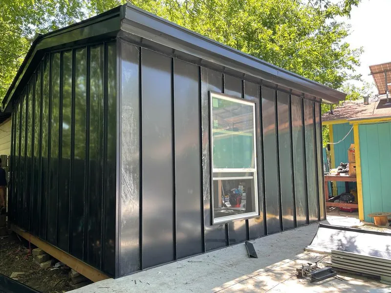 Black standing seam metal wall panels for Metal Roof Installation in Douglass