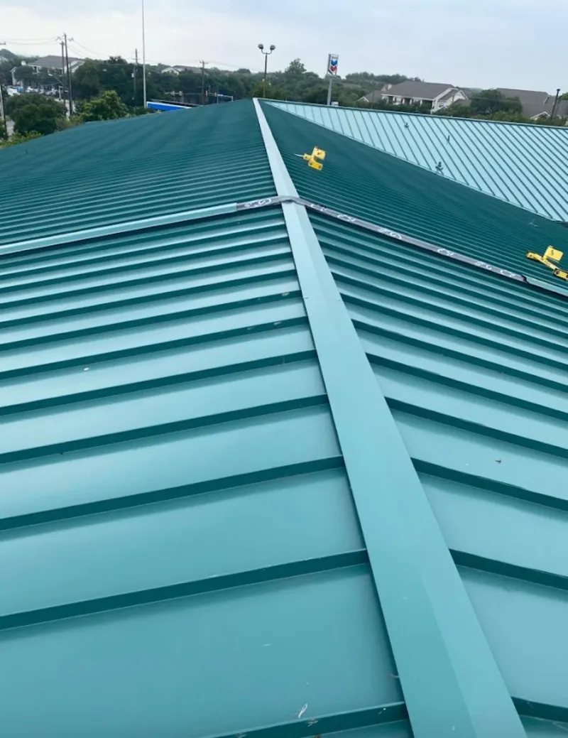 Green commercial metal roof ridge and valley for Metal Roof Repair in Douglass